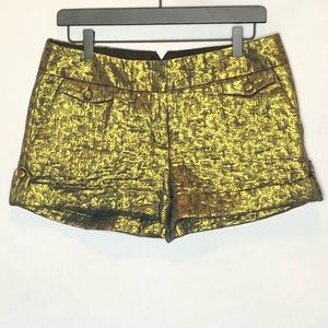 Express women’s shiny gold shorts size 8